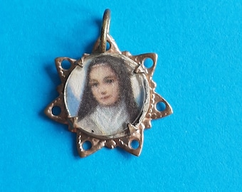 Vintage religious French open worked filigree pendant charm of Saint Theresia, St Therese of Lisieux France charm