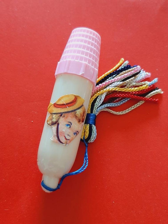 Vintage celluloid pink needle case, celluloid sewing kit, vintage sewing kit bullet, old etui sewing kit, vintage plastic etui with tassel