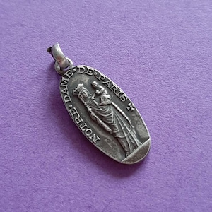 Vintage religious Catholic French oval silver plated medal pendant of Our Lady of Paris, Notre Dame de Paris, Montmartre Paris France