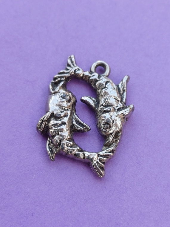 Vintage silver plated openwork charm of zodiac sig