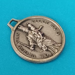 Vintage religious Catholic silver plated medal pendant of Our Lady of Zegge, Onze Lieve Vrouw van Zegge, Crowned Our Lady with Child charm