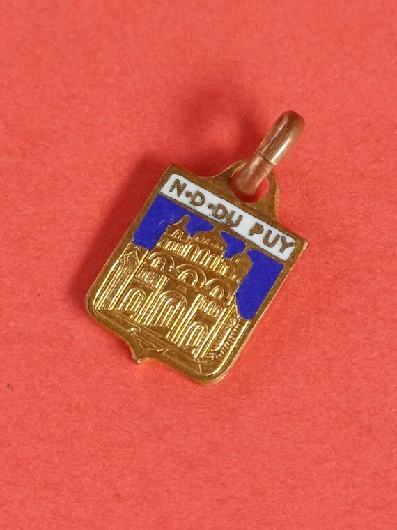 Vintage brass and enamel travel shield charm of Notre Dame Du Puy, Du Puy travel shield charm, crest Le Puy, Le Puy Cathedral souvenir charm