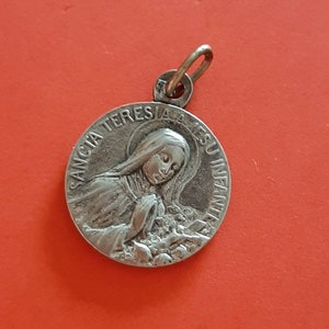 Vintage religious Catholic French medal pendant of Saint Therese of Lisieux, old floral silver plated St Therese charm