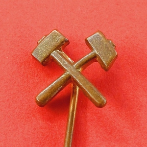 Vintage brass mining pin, mining tool symbol, old lapel pin of the mining workers, lapel pin mining