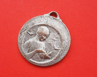 Antique French art nouveau signed French 1920 silver plated art medal pendant of a woman with a bird, signed PAUTOT, Journée Nationale