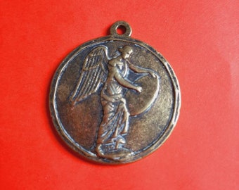 Ancient Greek brass medal pendant of a Goddess of the ancient Greek, brass mythology medal pendant, winged Goddess