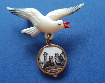 Vintage celluloid seagull Germany souvenir brooch, souvenir Deutschland seagull brooch of the Externsteine charm