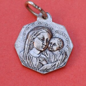 Vintage religious Catholic silver plated medal pendant of Saint Rita, St Rita and Our Lady with Child charm, old Saint Rita charm