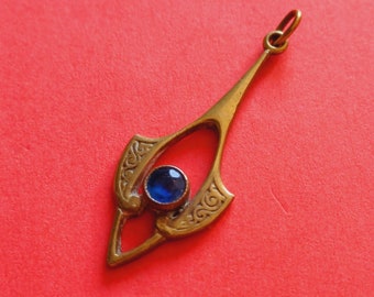 Antique copper gold plated French art nouveau pendant charm with classic design with a blue zirconia