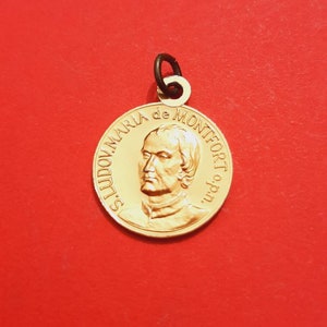 Vintage religious Catholic gold plated aluminum medal pendant of Saint Louis-Marie Grignion de Montfort and Fatima La Panne