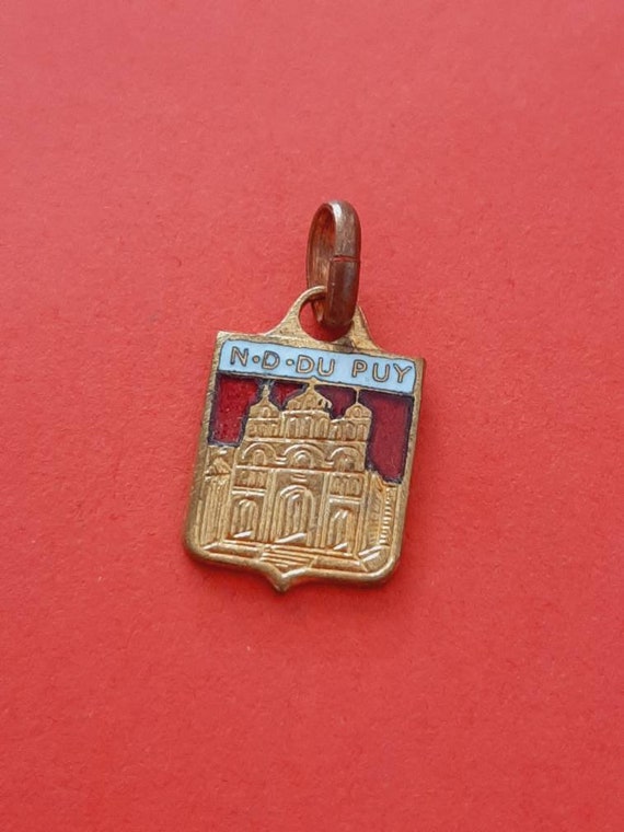 Vintage brass and red enamel travel shield charm of Notre Dame Du Puy France, Le Puy travel shield charm, Le Puy Cathedral souvenir charm