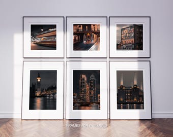 May include: Six framed art prints featuring nighttime cityscapes. The images showcase iconic London landmarks, including Big Ben, the London Underground, and modern skyscrapers, all illuminated with warm, inviting light. The phrase "FRAMES NOT INCLUDED" is visible.