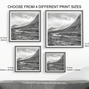 May include: Four framed landscape prints in varying sizes, from 6" to 12", are displayed on a white wall. The black and white images depict a river winding through a mountainous terrain under a cloudy sky. The text "CHOOSE FROM 4 DIFFERENT PRINT SIZES" is at the top.