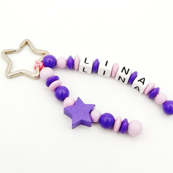 Taschenbaumler/keyring with name-Star in purple/pink