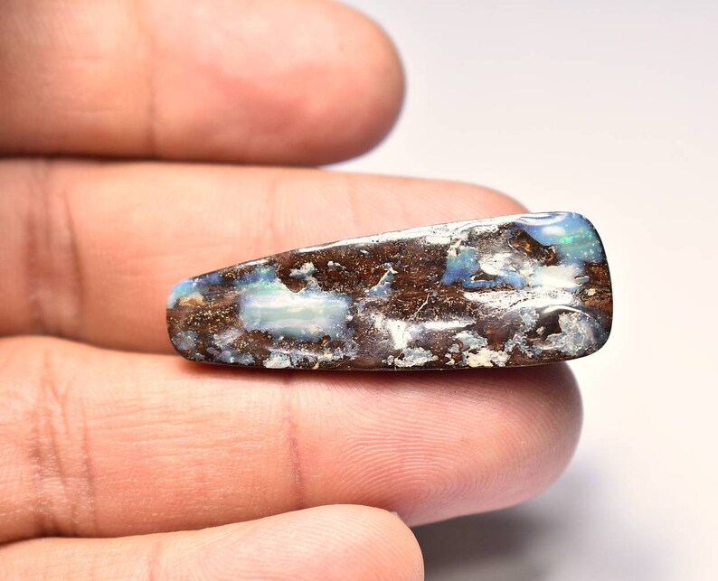 Natural Australian Boulder Opal freeform cabochon.....41x13x6mm....32CTS....B#2553