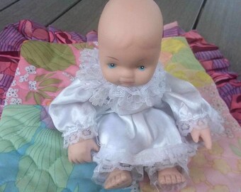 Small bisque vintage baby doll/80s