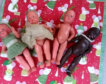 Set of 4 4" tall Celluloid Dolls from 1940s. All in excellent condition and with moveable limbs - Japanese/Asian origin