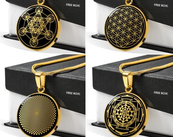May include: Four gold necklaces with different geometric pendants on black backgrounds. The pendants feature a flower of life, a sacred geometry symbol, a sri yantra, and a seed of life. Each necklace comes with a free box.