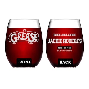 May include: Two red wine glasses with white text. The front glass has the word "GREASE" with a car graphic. The back glass has the text "RYDELL HIGH ALUMNI JACKIE ROBERTS Your Text Here TM & ©2024 Par Pics."