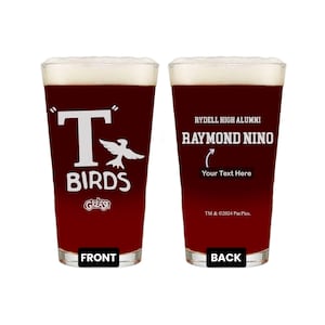 May include: Two clear glass beer mugs with a red liquid inside. The mug on the left has a white graphic of a bird and the text "T-Birds Grease". The mug on the right has the text "Rydell High Alumni Raymond Nino Your Text Here TM & ©2024 Par Pics.". The text "Front" is printed below the left mug and "Back" is printed below the right mug.