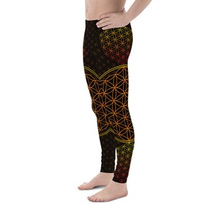 May include: Black leggings with a geometric pattern of a flower of life design in yellow and orange.