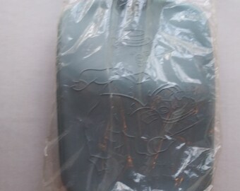 Botella de agua caliente de juguete de color azul aguamarina claro "Este cerdito fue al mercado"