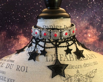 Black Star in red and silver