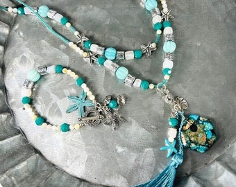 Collar Pulsera 2 Hebras Cerceta Estrella de Mar Arena Dólar Concha Marina Tono Plata Borla