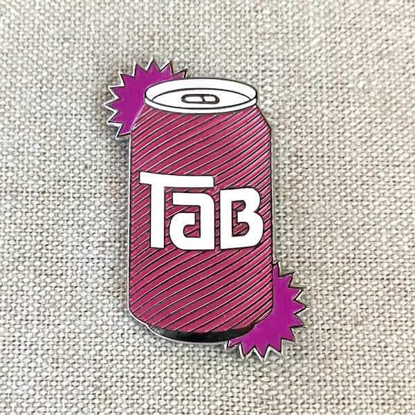 TaB Soda enamel pin. How can 1 calorie look so good?! It'll look even better as you wear your TaB love for everyone to see! Tab-lover gift