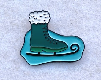 Ice Skate enamel pin – This pin glides across the ice! Wear your ice skating love with this cute pin. Great gift for any ice skater!