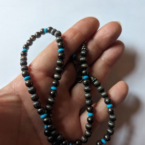 Sterling silver and turquoise beaded necklace.