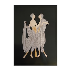 May include: Two figures in a stylized art deco style, wearing flowing silver robes with gold accents, against a black background.