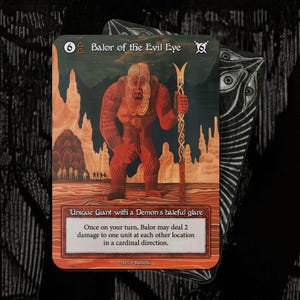 Pode incluir: Carta colecionável com um gigante vermelho chamado "Balor of the Evil Eye". A carta inclui texto que descreve as habilidades do gigante, ambientada em uma caverna. Parte de um jogo de fantasia.