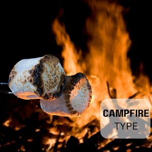 May include: Two toasted marshmallows on a stick over a campfire. The marshmallows are golden brown and slightly melted. The campfire is in the background and is burning brightly.