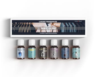 May include: A set of six small glass bottles with labels featuring different men's fragrances. The bottles are arranged in a row on a white surface. The box in the background reads "Luxury Fragrances Masculine Provokes a supernatural attraction."