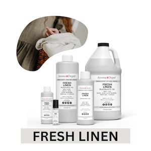 May include: A collection of Aroma Depot Fresh Linen fragrance oil bottles in various sizes. The bottles are white with black text, and the largest container has a black handle. The text "Fresh Linen" is displayed at the bottom.