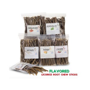 May include: Several clear plastic bags filled with licorice root chew sticks. Each bag is labeled with a different flavor: strawberry, peppermint, natural, mango, and cherry. The text "FLAVORED LICORICE ROOT CHEW STICKS" is displayed in green and red.