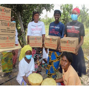 Picture Taken in West Africa-Ghana. A total of 3 African women hold Aroma Depot 100% Natural Shea Butter Product of Ghana Ivory Shea Butter. Two African women hold a wooden bowl with yellow African Shea Butter kneeling down.