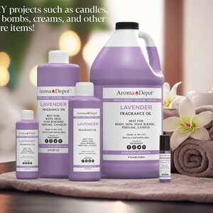 May include: Five bottles of lavender fragrance oil in various sizes, from a small 10 ml roll-on bottle to a large 1 gallon jug. The bottles are all purple and have a white label with the text "Aroma Depot" and "Lavender Fragrance Oil". The bottles are arranged on a table with a purple towel and white flowers.