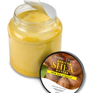 3 lb. Clear Wide-mouth Jar with the Sealed opened showing the inside Ivory Shea Butter inside of the jar.  A lid is placed in front of the jar with a label that reads Aroma Depot African Shea Butter 100% Raw & Natural. Single item, white background.