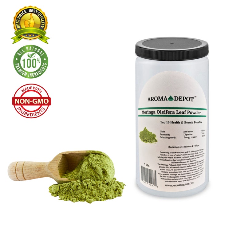 May include: A white plastic jar with a black lid containing green Moringa Oleifera Leaf Powder. The jar is labelled "AROMA DEPOT&trade; Moringa Oleifera Leaf Powder" and lists the top 10 health and beauty benefits of the powder. A wooden scoop is filled with the powder and sits on a white surface.