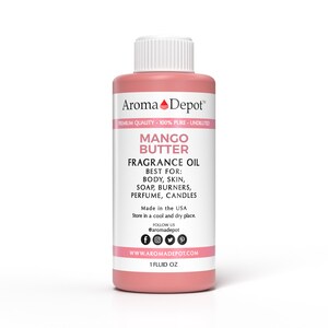 May include: A pink bottle of Mango Butter fragrance oil. The bottle is labeled "Aroma Depot" and says "100% Pure - Undiluted". The label also says "Best For: Body, Skin, Soap, Burners, Perfume, Candles". The bottle is 1 fluid ounce.