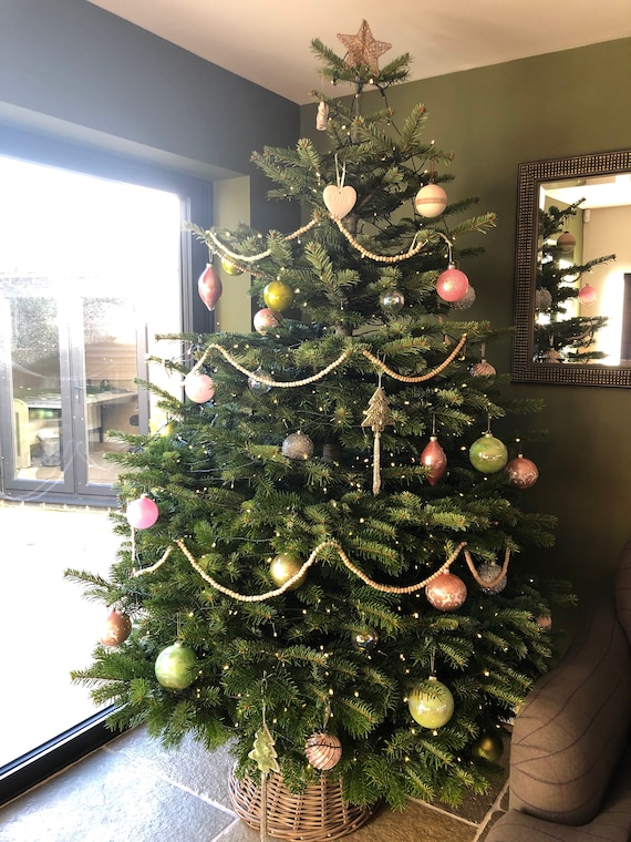 Simple Christmas tree garland created from a wooden bead garland