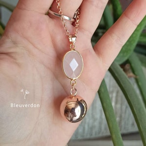 Pink quartz and rose gold pregnancy bola