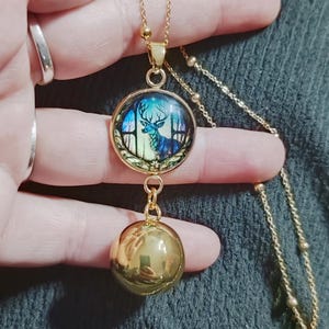 Golden deer pregnancy bola. Stainless steel chain