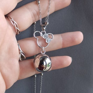 Silver pregnancy bola with rhinestones. Stainless steel chain