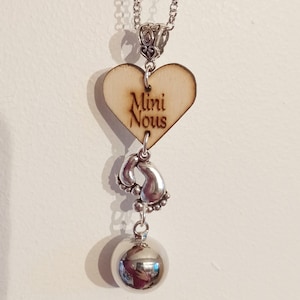 Mini pregnancy bola with little silver feet. Wooden pregnancy bola. Bola can be personalized upon request.