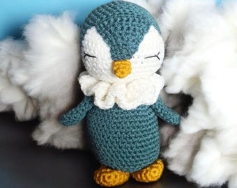 Handmade crocheted penguin plush. Amigurumi penguin.