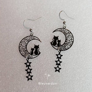 Black moon and star cat earrings