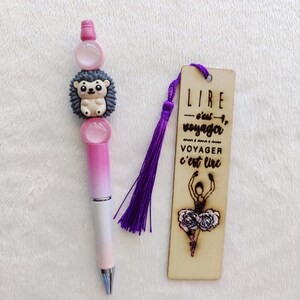 A set of creations for birthday gifts or other gifts. A decorated pen and a wooden bookmark. Handmade gifts at low prices.